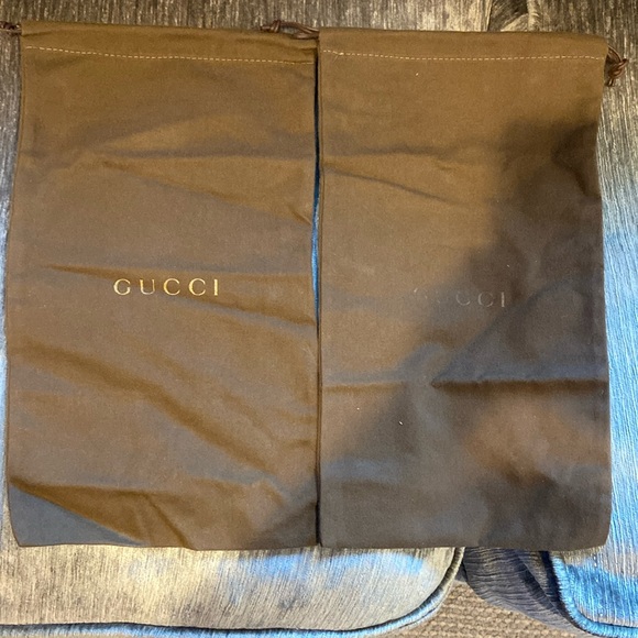Gucci shoe bags. Two matching brown bags. 1 red bag which could fit a small bag. - Picture 1 of 4